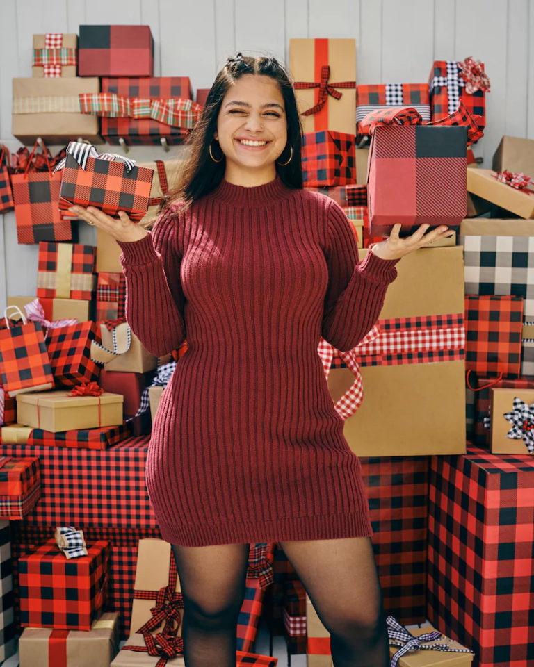 On Christmas, nothing goes wrong with a red sweater dress that you may pair with knee-high or ankle-high boots.