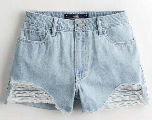 pair of jean shorts from hollister that are high rise and light wash mom shorts with distress rips in the front 