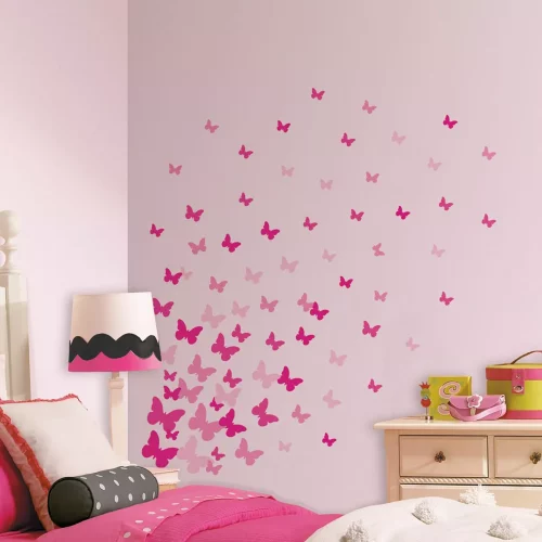 pink butterfly wall decals on pink wall in pink and black girly room