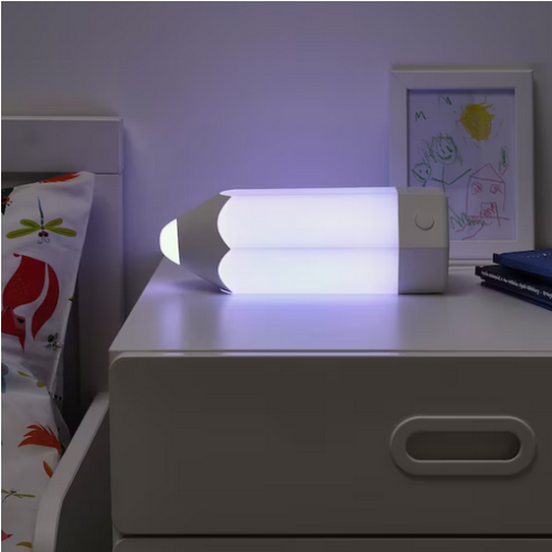 pencil shaped LED deesk lamp on a nightstand
