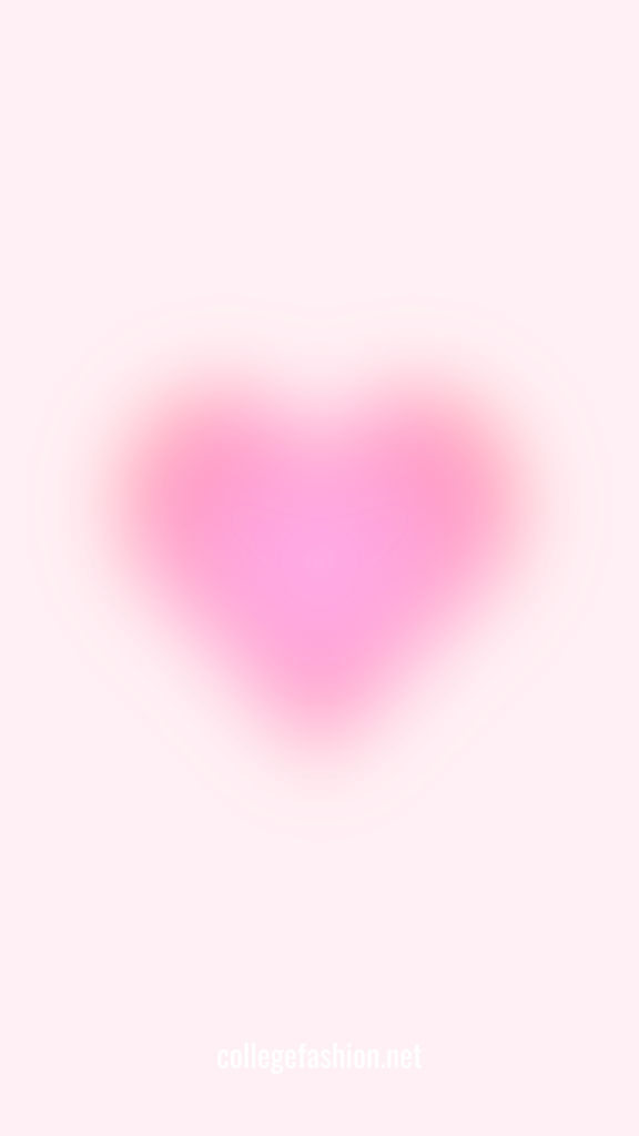 Blurred heart on pink background valentines wallpaper