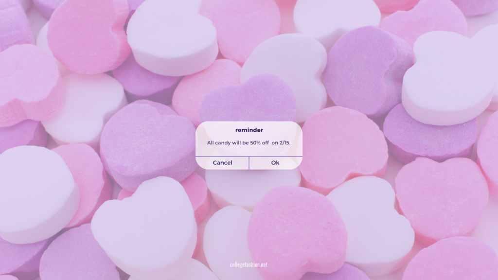 Desktop wallpaper that reads Reminder: All candy will be 50% off on 2/15