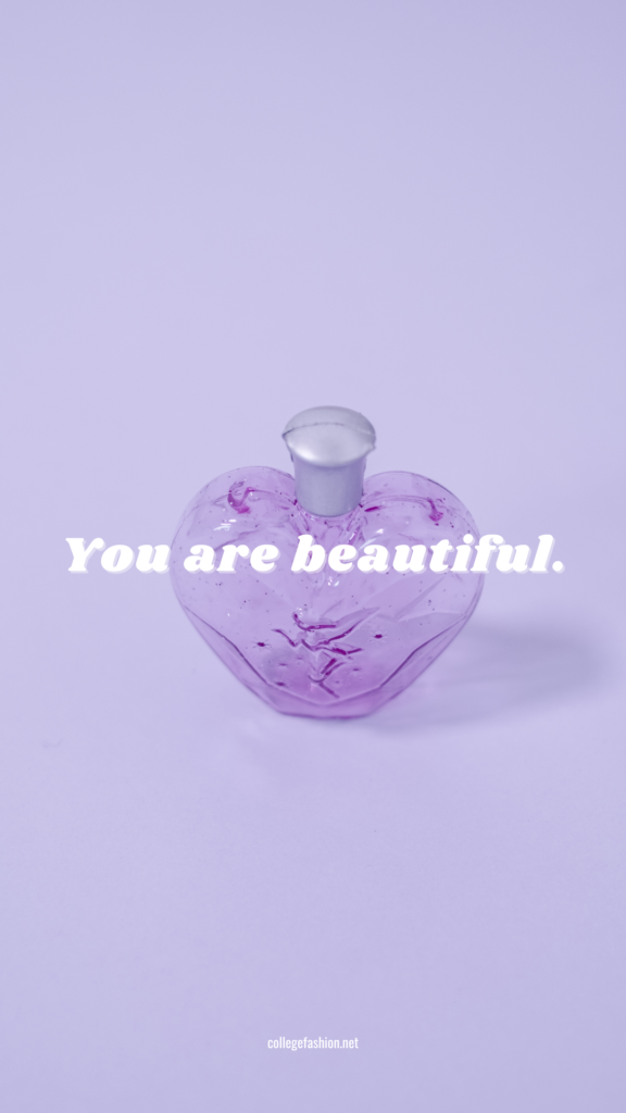 Simple iphone wallpaper for Valentine's Day with the text You Are Beautiful set on top of a photo of a purple perfume bottle