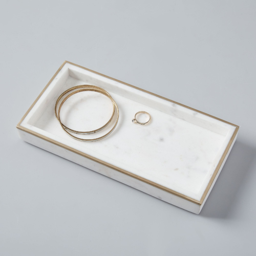 Affordable college graduation gift ideas: Marble and brass jewelry tray from West Elm