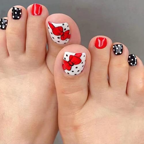 Polka Dot bow nail design from Amazon