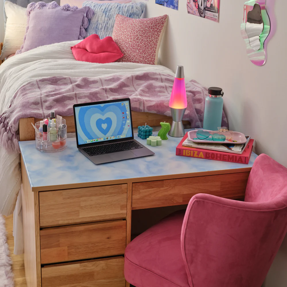 Removable wallpaper applied to a dorm room desk