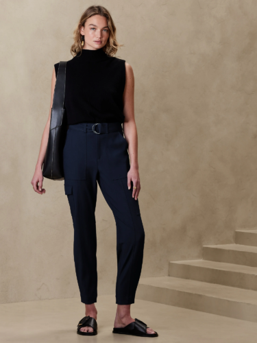 Business casual summer outfit: Navy cropped pants, black turtleneck tank, black chunky sandals