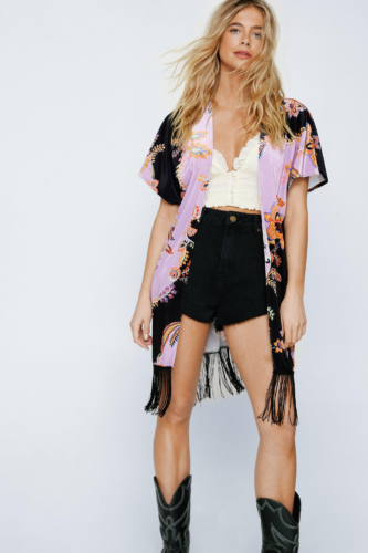 Kimono, shorts, crop top, cowboy boots outfit for music festival