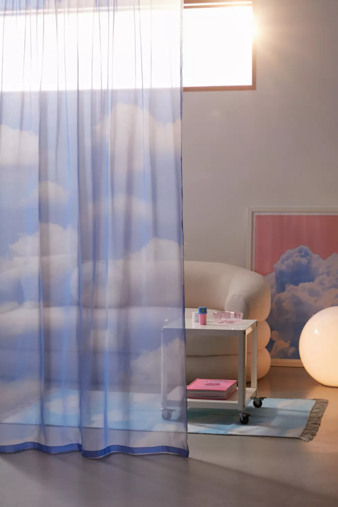 Sheer cloud curtain from Urban Outfitters used to divide a room
