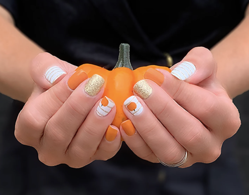 Orange & white pumpkin nails from Etsy