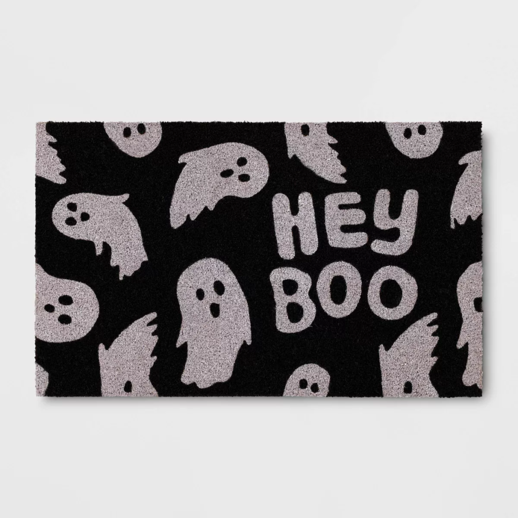 Black and white ghost graphic doormat that reads "Hey Boo"