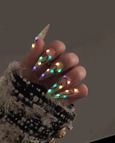 Glow in the dark Christmas lights nails from Etsy