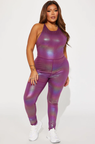 Plus size purple metallic shimmer jumpsuit paired with sneakers for Mardi Gras