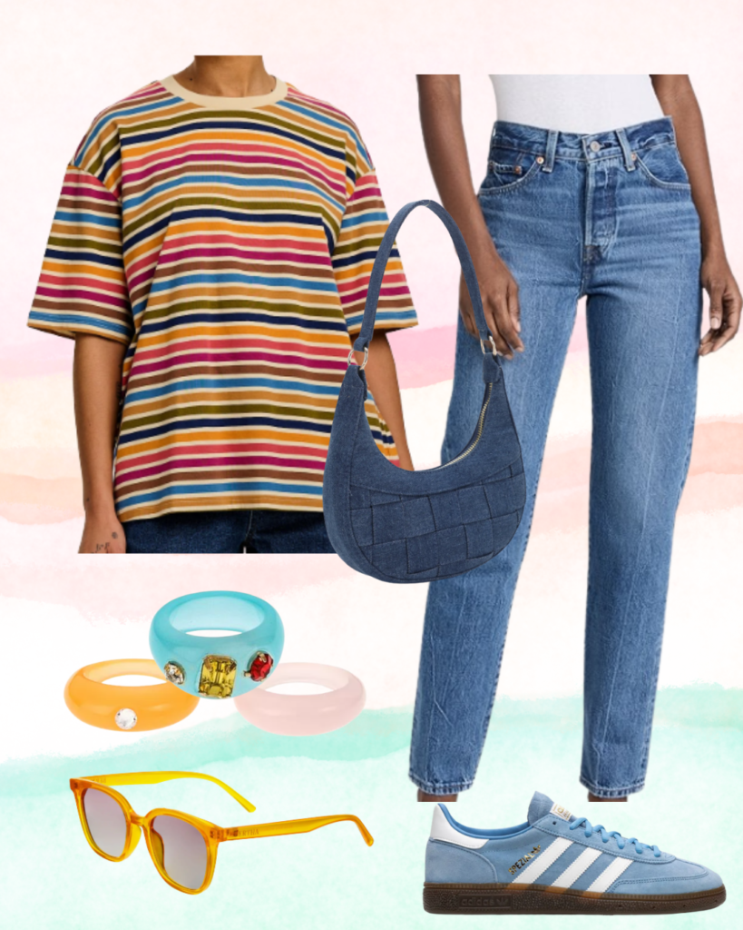 Jeans and striped t-shirt outfit idea: Medium wash straight leg jeans, light blue Adidas sneakers, mustard yellow, red, and teal striped t-shirt, denim blue mini bag, colorful resin rings, yellow acetate sunglasses